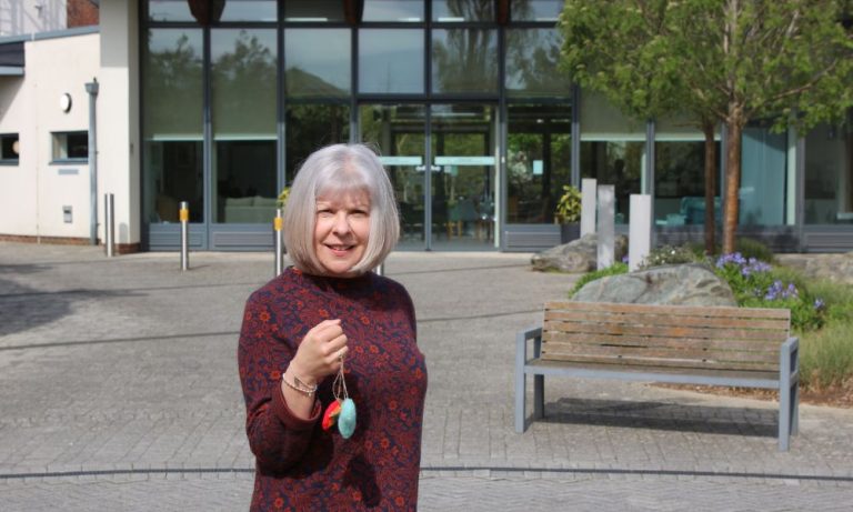 A woman staring at camera