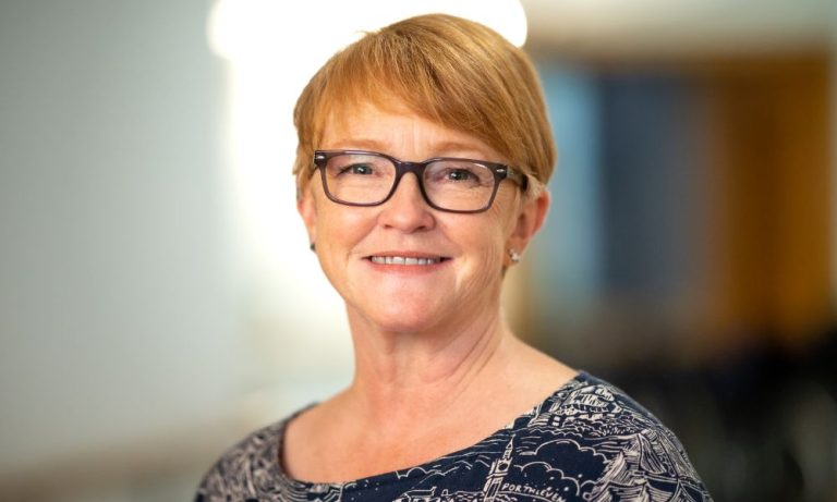 A person looks at the camera